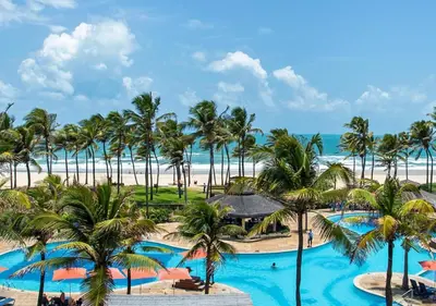 A piscina em ou perto de Suites Resort ao lado do Beach Park e Pé na areia Apt térreo adm por anfitrião