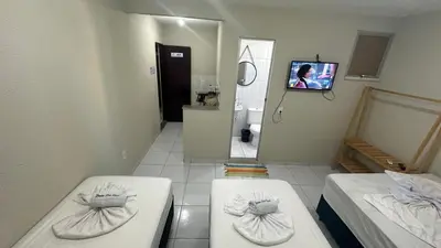 Uma cama ou camas num quarto em Garden Flat Beach