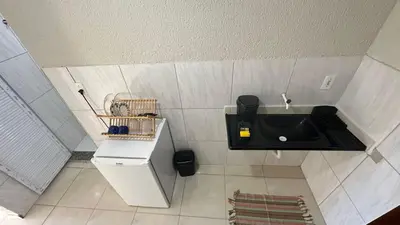 A cozinha ou kitchenette de Garden Flat Beach