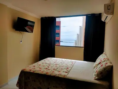 Uma televisão e/ou sistema de entretenimento em Refúgio em Mucuripe