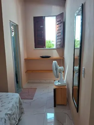 Uma cama ou camas num quarto em Chalé da Ana