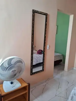 Uma cama ou camas num quarto em Chalé da Ana