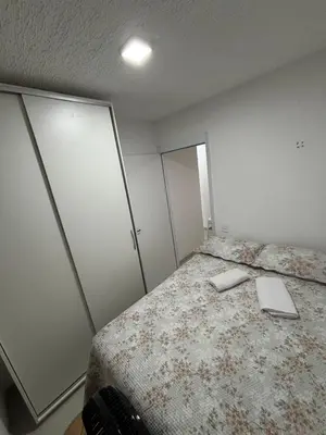 Uma cama ou camas num quarto em Apartamento Fortaleza Beira-mar praia do futuro