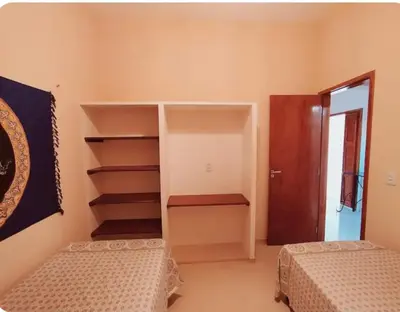 Uma cama ou camas num quarto em Conforto em Praia Paradisíaca