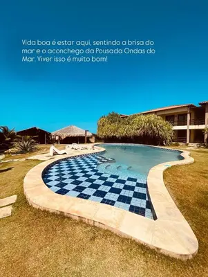 A piscina em ou perto de Apartamento Ondas do Mar - Taíba