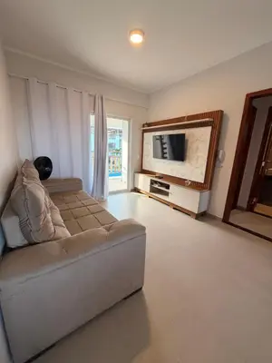 Uma televisão e/ou sistema de entretenimento em Apartamento Superior 18b Boas Vistas