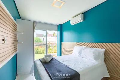Uma cama ou camas num quarto em Aptos em Cond. c/ Piscina a 1 Quadra da Praia de Cumbuco - KVI