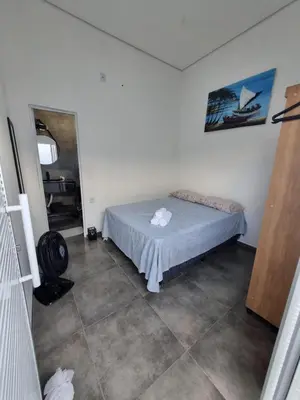 Uma cama ou camas num quarto em Casa Horizonte Azul