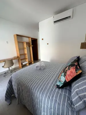 Uma cama ou camas num quarto em Villa Rita - Preá