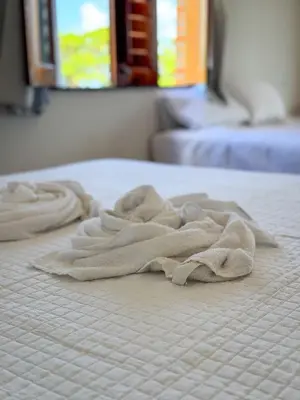 Uma cama ou camas num quarto em ALBERGUE Lagoinha