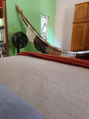 Uma cama ou camas num quarto em Casa Luiza Pontal de Maceió - Fortim