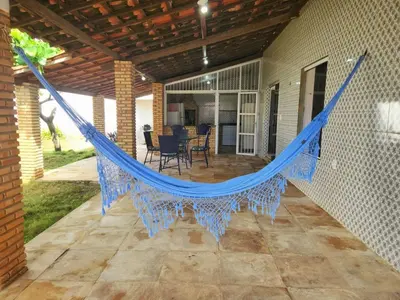 Um pátio ou outra área exterior em Casa Pe na Areia com Piscina e Ar em Morro Branco