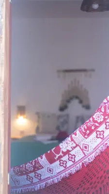 Uma cama ou camas num quarto em Vila Manguita Suíte Manguita