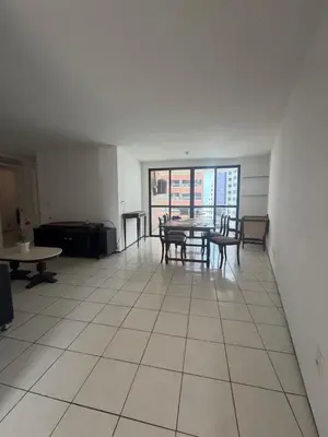 Uma área de estar em Apartamento beira mar sol maior