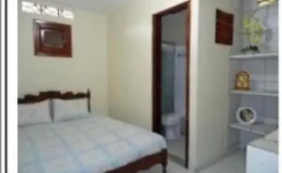 Uma cama ou camas num quarto em Aconchego da serra no centro de Pacoti