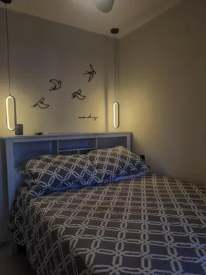 Uma cama ou camas num quarto em Flats Vento da Serra