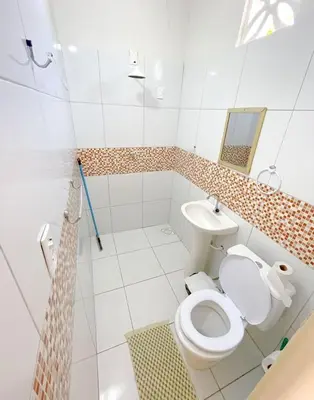 Uma casa de banho em Sua própria pousada na praia