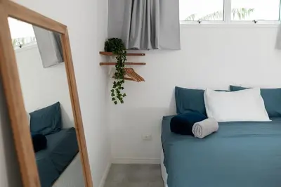 Uma cama ou camas num quarto em Kicoh - Kite Community House