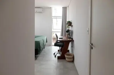 Uma cama ou camas num quarto em Kicoh - Kite Community House