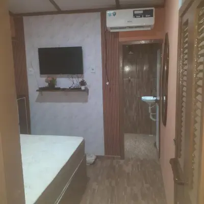 Uma televisão e/ou sistema de entretenimento em Sereia beach chalé