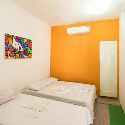 Uma cama ou camas num quarto em Pousada Maresia