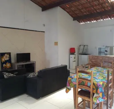 Uma televisão e/ou sistema de entretenimento em JW casa de praia