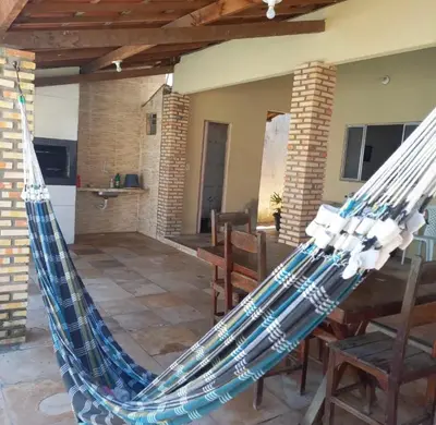 Um pátio ou outra área exterior em JW casa de praia