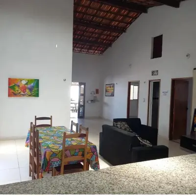 Uma área de estar em JW casa de praia