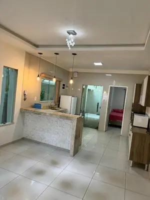 Uma cama ou camas num quarto em Casa completa com 3 quartos,ar e garagem