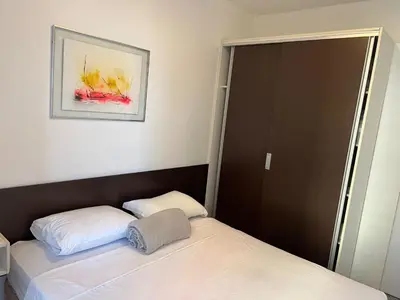 Uma cama ou camas num quarto em Flat em Fortaleza - Ce Vista Mar - Meireles