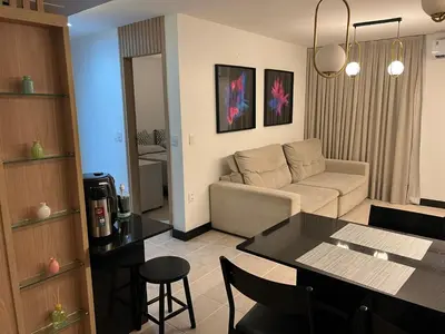 Uma área de estar em Apartamento Mobiliado Fortaleza - uma quadra da Beira Mar