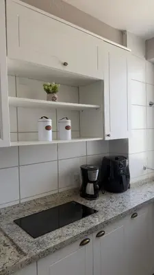 A cozinha ou kitchenette de Ap Mirante Fortaleza 5min da Praia com Piscina e Rooftop para 6 pessoas
