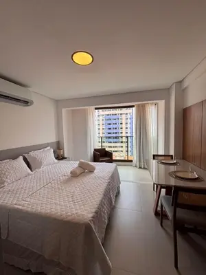 Uma cama ou camas num quarto em Beach class Meireles -412