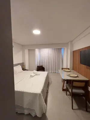 Uma cama ou camas num quarto em Beach class Meireles -412