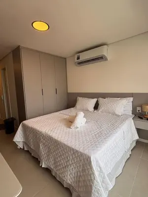 Uma cama ou camas num quarto em Beach class Meireles -412