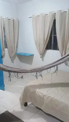 Uma cama ou camas num quarto em Ap do Jhone
