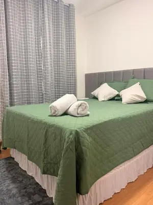 Uma cama ou camas num quarto em Apartamento em Fortaleza