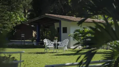 Um jardim no exterior de Hotel Fazenda Portal das Montanhas