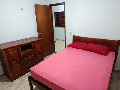 Uma cama ou camas num quarto em Camile vista da Serra-prime