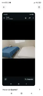 Uma cama ou camas num quarto em Quarto com ar condicionado