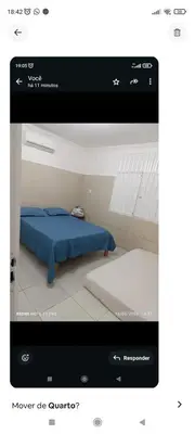 Uma cama ou camas num quarto em Quarto com ar condicionado