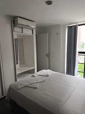 Uma cama ou camas num quarto em Flat atlantico 301