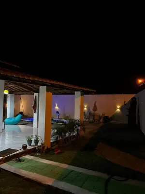 A piscina em ou perto de Casa de praia com piscina
