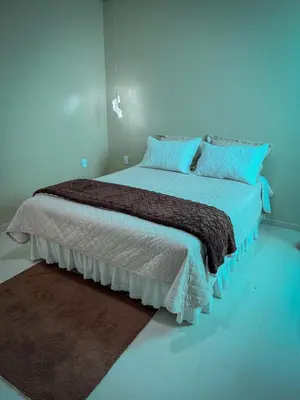 Uma cama ou camas num quarto em CASA LUME Mulungu CE 20 min from Guaramiranga