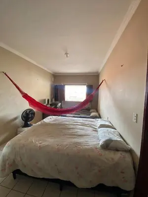 Uma cama ou camas num quarto em Comfortable house in Paracuru - Spacious and airy