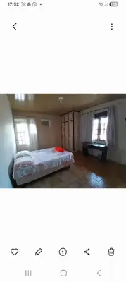 Uma cama ou camas num quarto em Alto Astral
