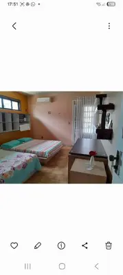 Uma cama ou camas num quarto em Alto Astral