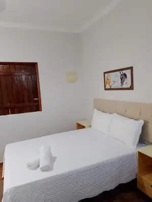 Uma cama ou camas num quarto em Mad Horse