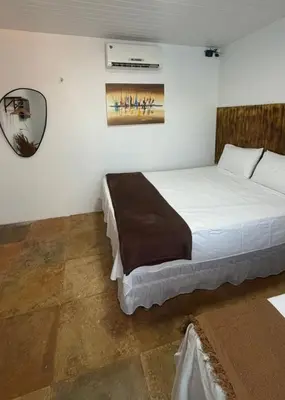 Uma cama ou camas num quarto em Cumbuco Acqua Beach Pousada