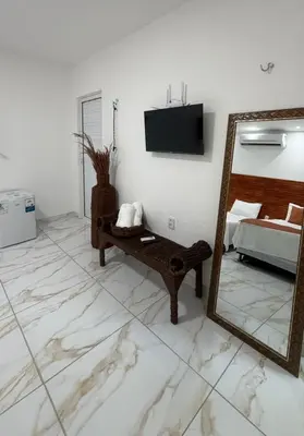 Uma cama ou camas num quarto em Cumbuco Acqua Beach Pousada